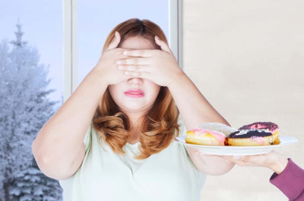 Look away from food to stop mindless eating.
